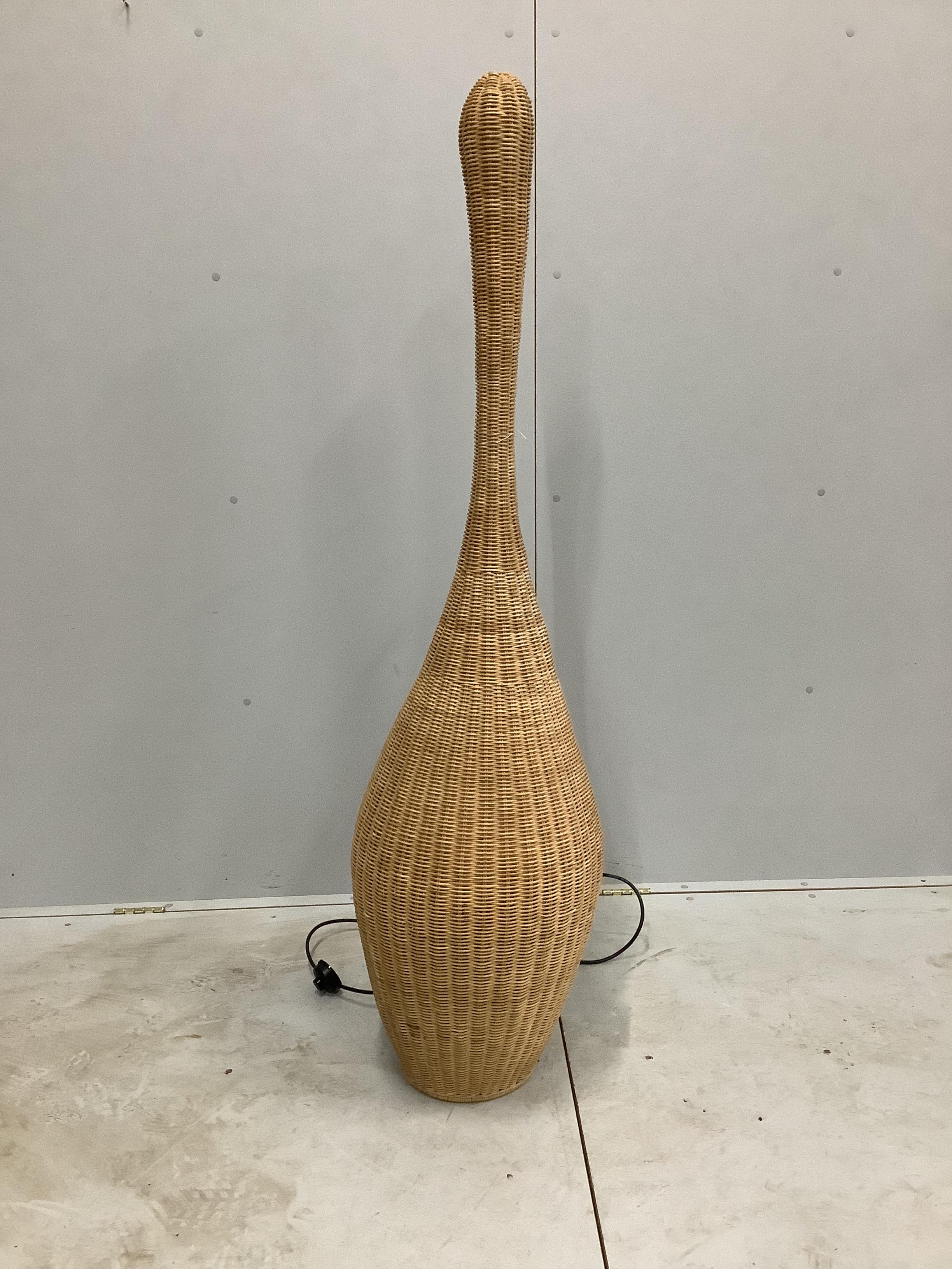 An Italian Gervasoni Bolla rattan floor lamp, height 158cm